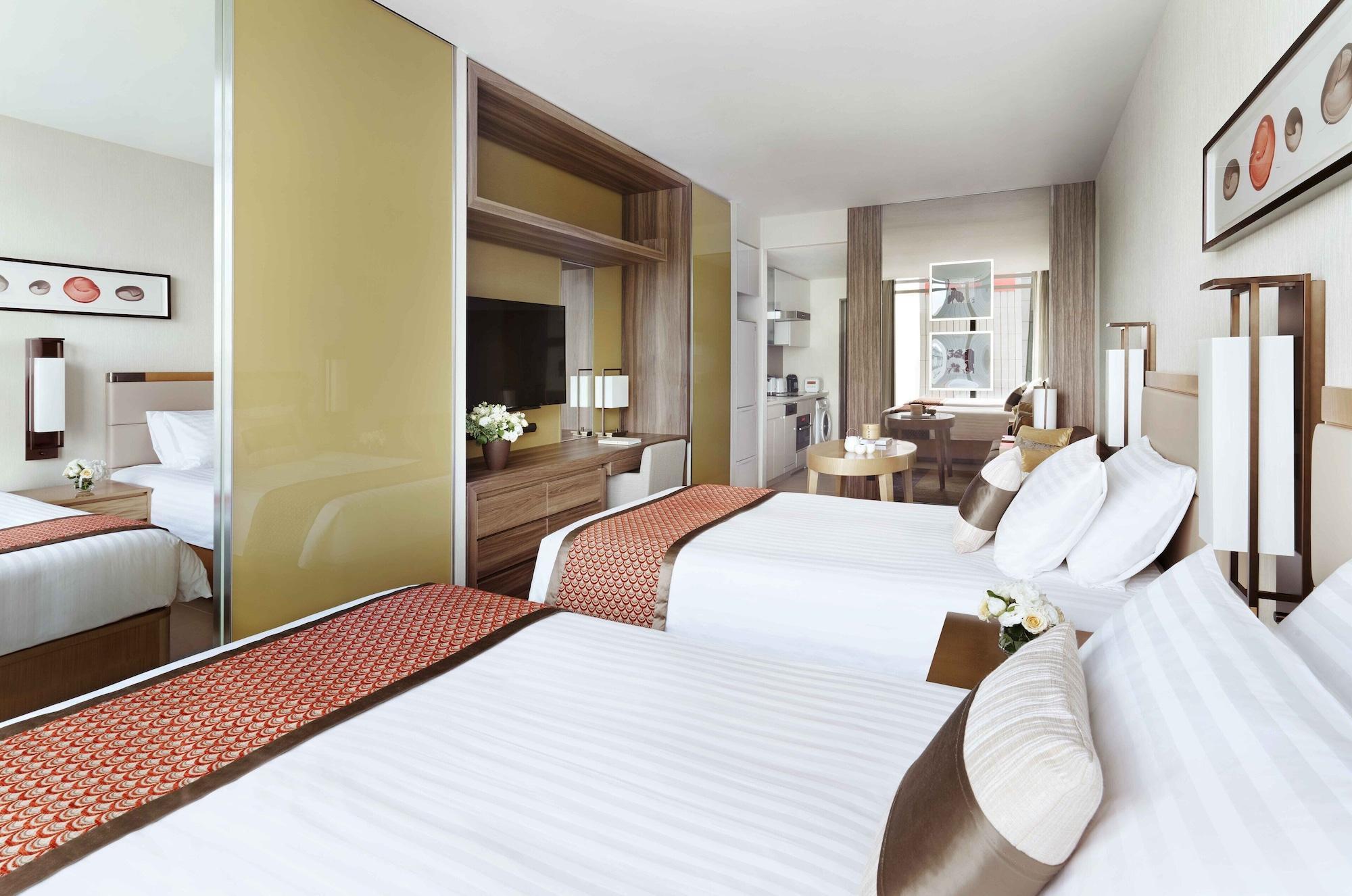 Oakwood Premier Tokyo Hotel Exterior photo A typical room at the hotel