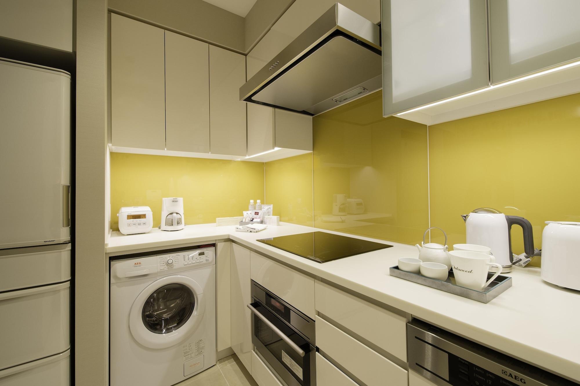 Oakwood Premier Tokyo Hotel Exterior photo A typical kitchen in a serviced apartment