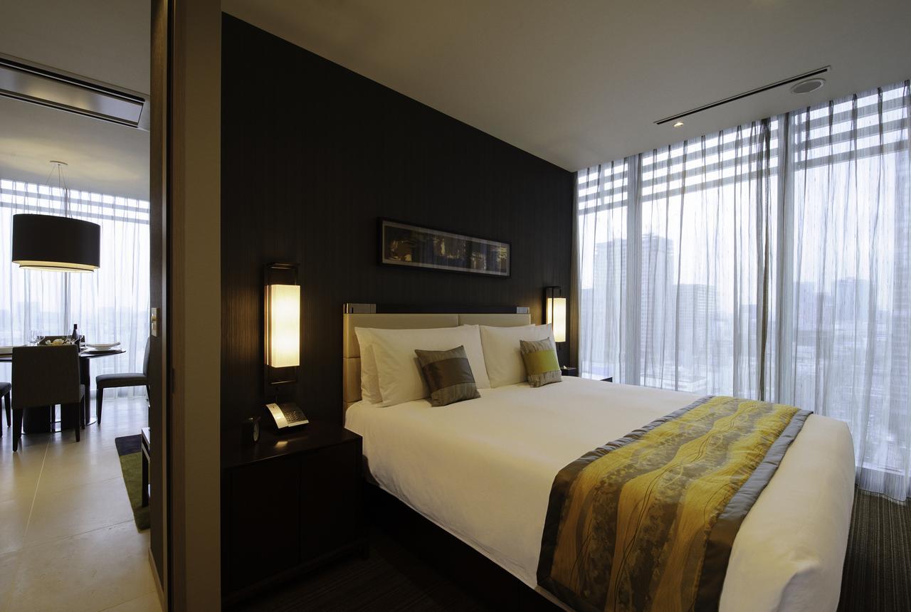 Oakwood Premier Tokyo Hotel Exterior photo A bedroom at the Park Hyatt Hyderabad